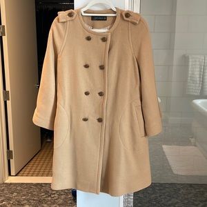 Camel three quarter length coat.